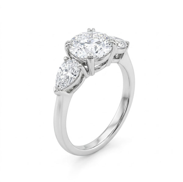 1Ct Round With Pear Ring
